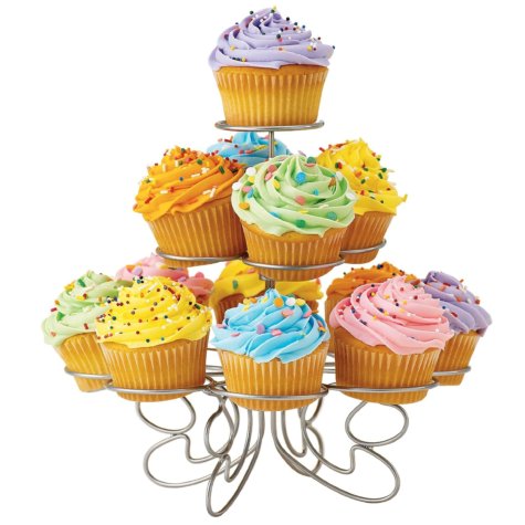 Dog cakes with pastel icings, on a cupcake stand
