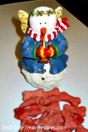 Anise Holiday Dog Bones with snowman playing trumpet