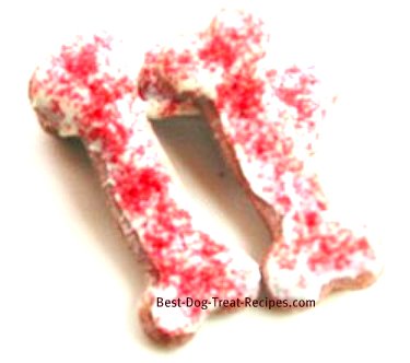 decorated dog bones with icing and red sprinkles